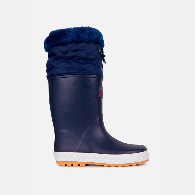 Navy Puddleflex Fleece Lined Wellies, a blue rubber boot with a quilted upper and faux fur trim, plus a white and orange sole.